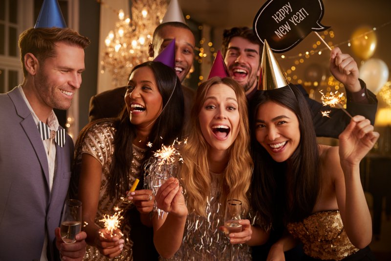 Friends with good dental health celebrating the new year